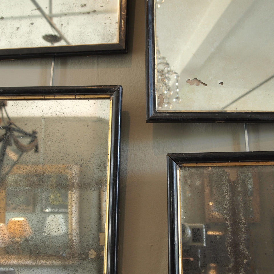Collection of ebonised mirrors